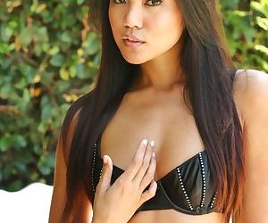 Beautiful Asian model Cat XOXO unveils her small teen tits