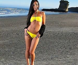 Miko sinz spreads her fine asian pussy on the beach - part..