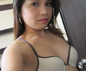 Tiny Asian girl shares self shots of her small hard nipples