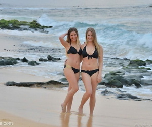 Teen lezzies Veronica and Nicole doff their swimsuits for..