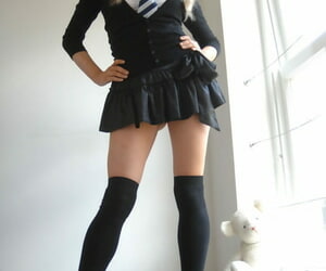 Hot blonde schoolgirl Elle Parker sheds uniform posing..