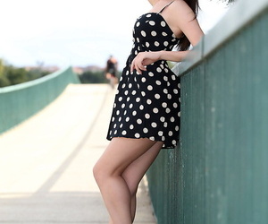 Solo girl eliminates her polka dot sundress while out for..