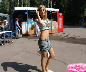Lean teenager with long legs in brief miniskirt looking..