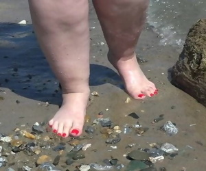 Fat Bare Legs with Red Pedicure..