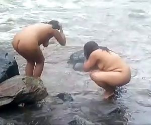 2992477 two indian mature womens bathing in river naked -..