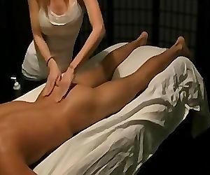 Indian babe giving full body massage to young boy happy..