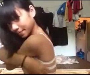 young thai girl show tiny tits on..