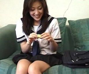Shy jap doll in school uniform..