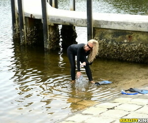 Blonde chick in wetsuit gets picked up at the lake for a..