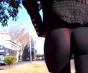 Brunette teen doesnt know we can see her red thong through her leggings !