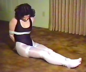 Woman in Black Leotard and White Tights