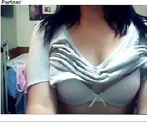 Teen girl flashes big tits on cam-See her at..