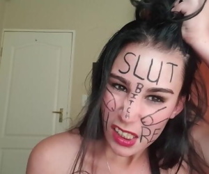 Self degrading slut gags herself and self face slapping..