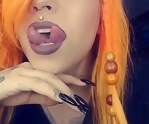 Beautiful girl showing her split tongue. You gotta see this.
